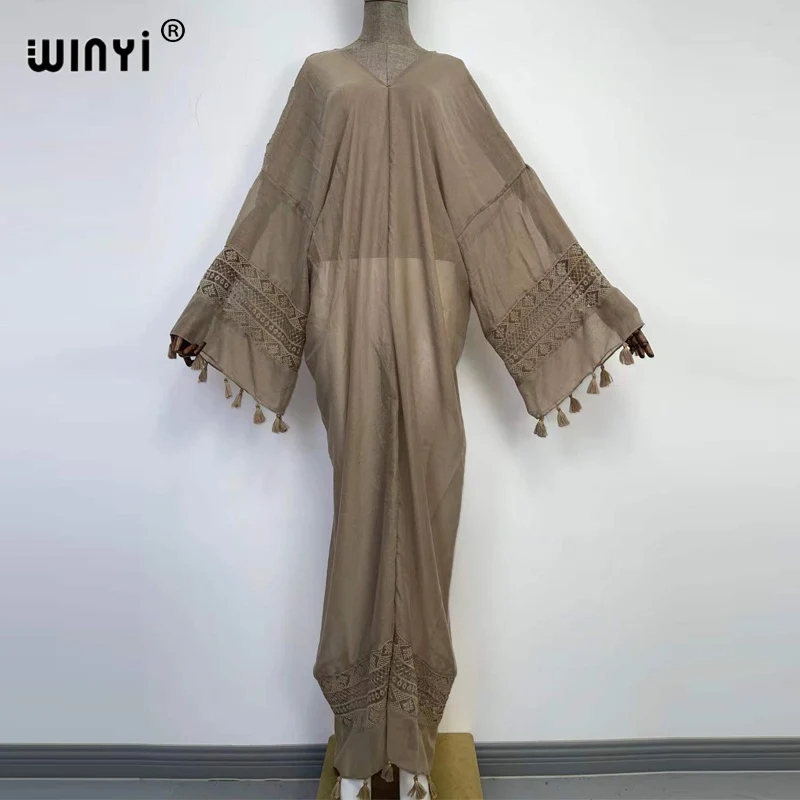 

Europe 2022 WINYI V-neck elegant kaftan Women tassel Long Loose robe femme free size Middle East Female Holiday long dress