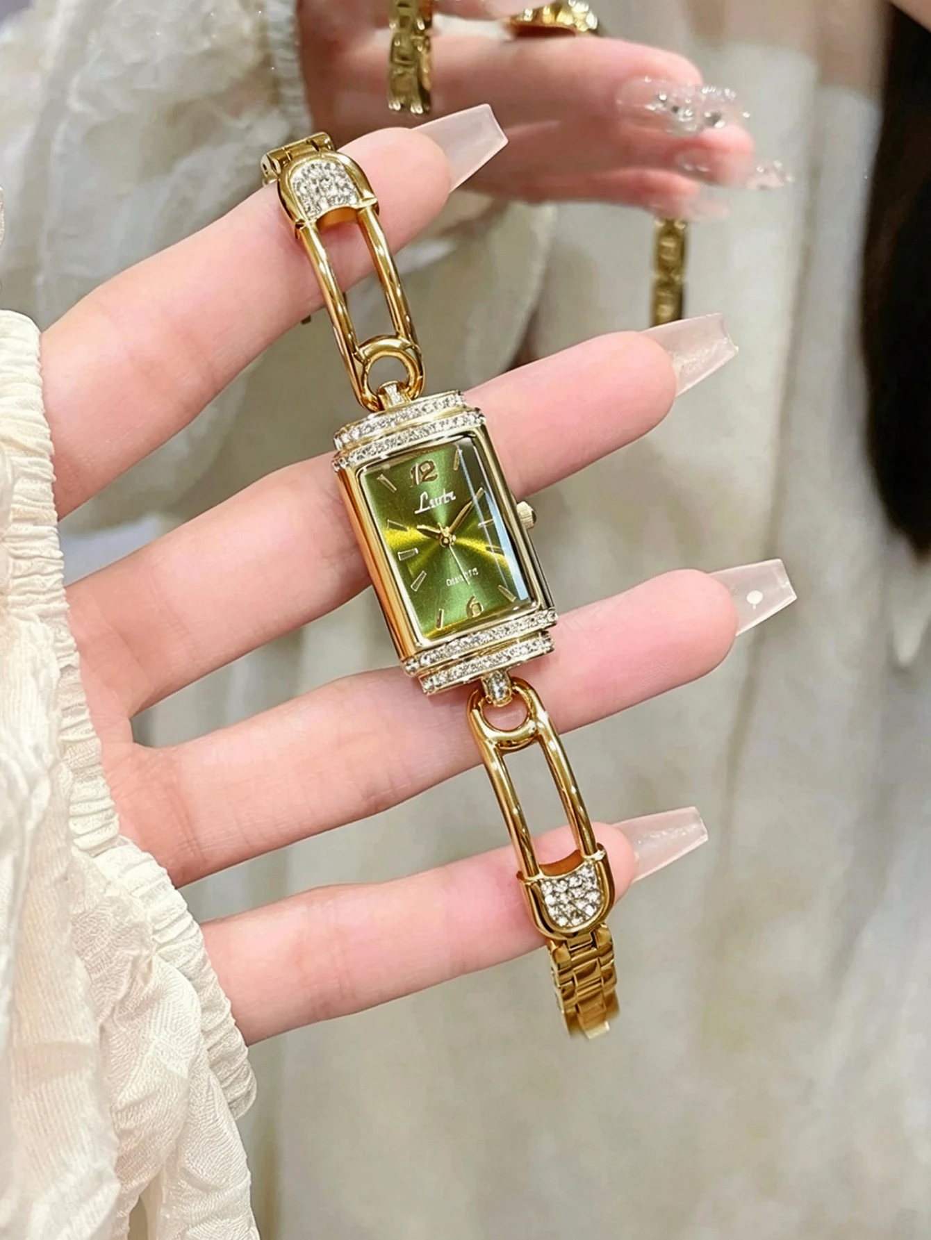 1 new gold women's quartz watch, rectangular case with green dial and rhinestones, elegant and niche women's watch design.