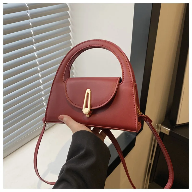 Borsa a mano con manico circolare di design bordeaux 2024 borsa a tracolla con serratura unica delle nuove donne moda Versatile borse ascellari per