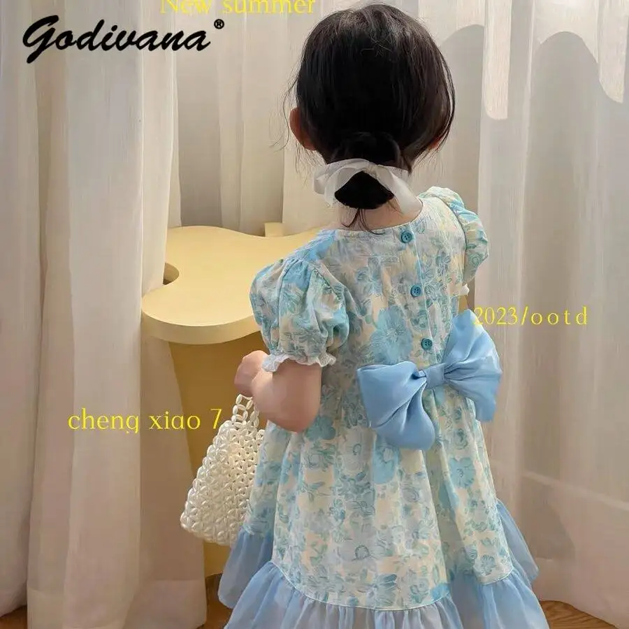 

Cute Baby Girls Summer 2026 New Fashion Dress Kids Sweet Floral Print Bow Lace Trim Mesh Patchwork O-neck Princess Casual Dress