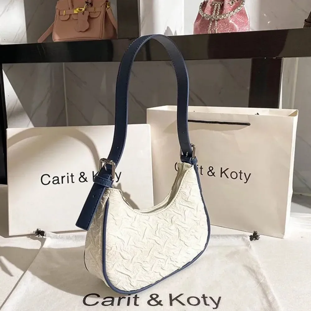 Original design advanced sense this year's popular pleated bag female summer niche design crescent bag underarm bag shoulder