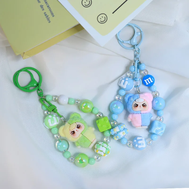 

A three-year-old child's car keychain ornament, a cartoon cute little clown doll, a bag hanging decoration.