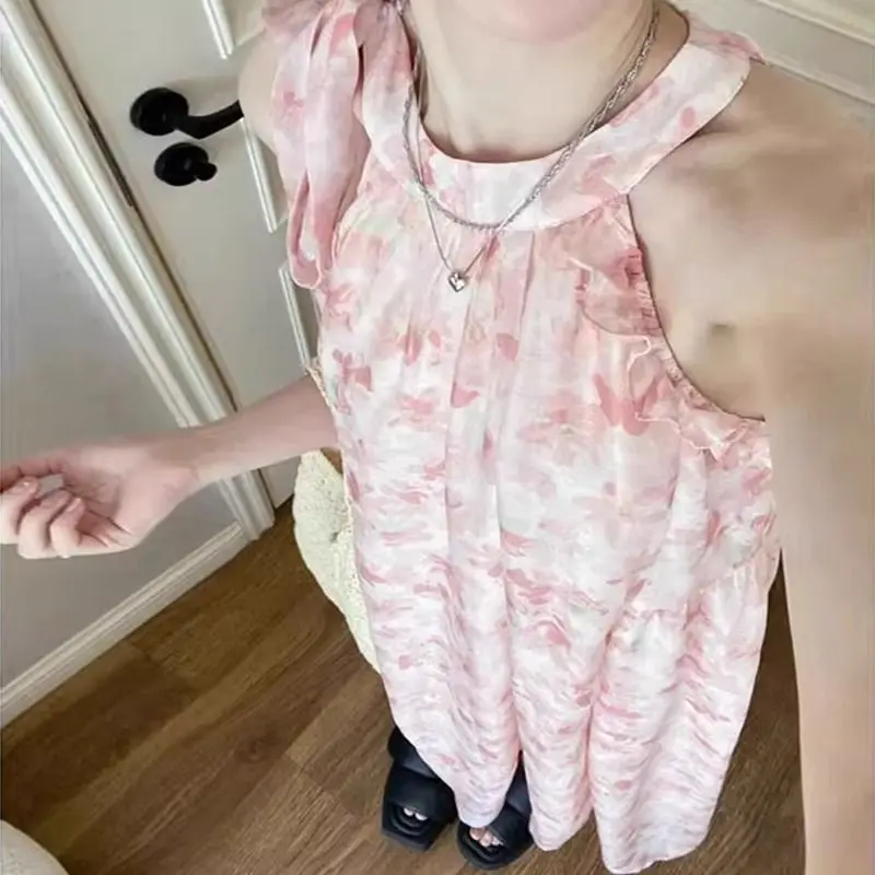 فستان ربيعي وصيف جديد مطبوع باللون الوردي الفرنسي بدون أكمام على طراز الشاطئ فستان عصري