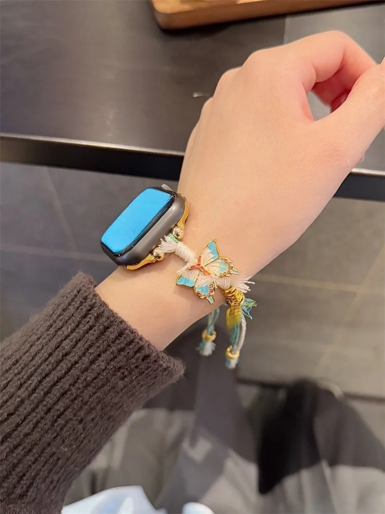 

Модный ремешок для iWatch с плетеным шнуром и монетами «Пять императоров» (дизайн «Бабочка»), совместимый с размерами 38 мм, 40 мм, 41 мм, 42 мм, 44 мм, 45 мм, 49 мм