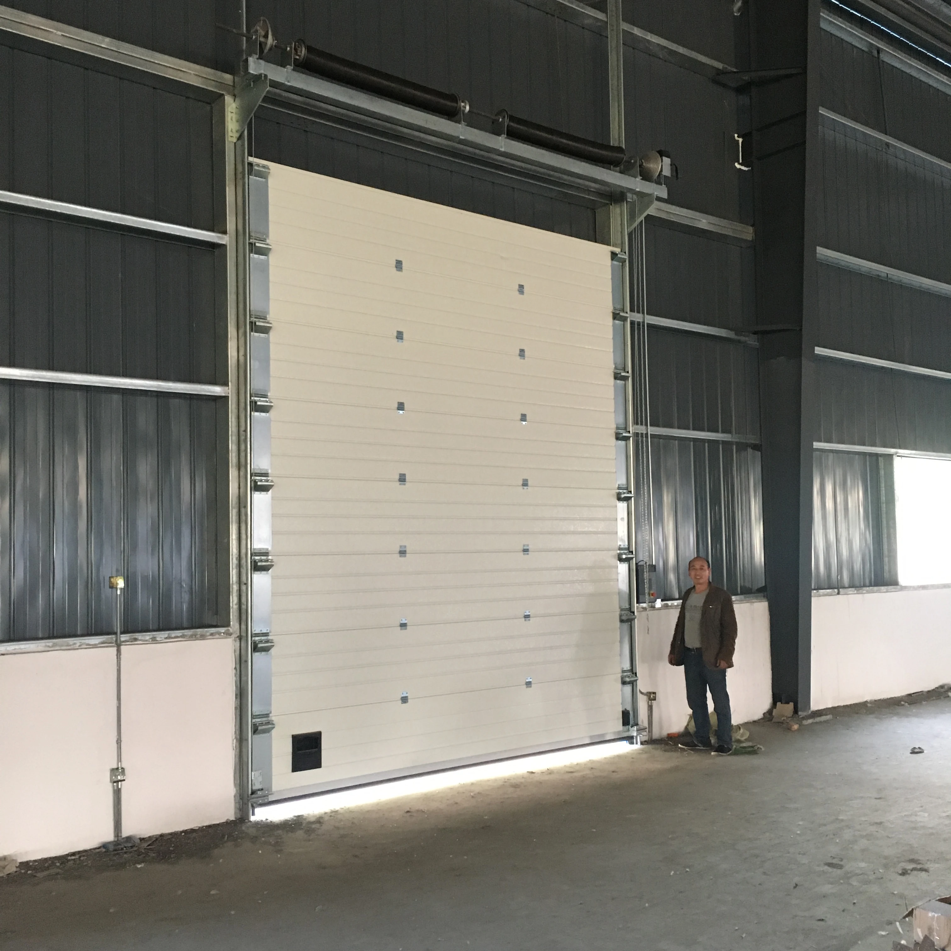 Industrial Vertical Lifting Overhead Sectional Security Door With Viewing Windows For Warehouse Logistics