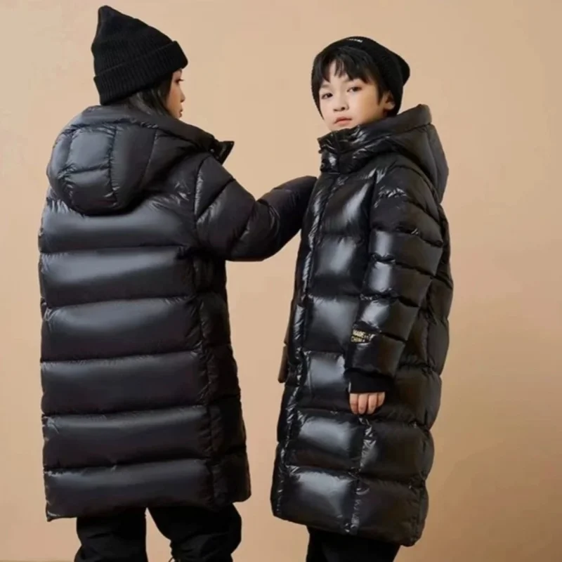Giacca invernale per ragazze adolescenti 2025 -33 ℃   Parka lungo con cappuccio spesso impermeabile lucido per tuta da neve in cotone caldo alla moda per bambini 4-12 anni