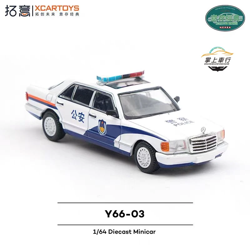 XCARTOYS 1:64 E-HS9 دبي اللوحة الأعمال سيدان الشرطة سيارة طبعة سبيكة يموت الصب نموذج جمع الحلي