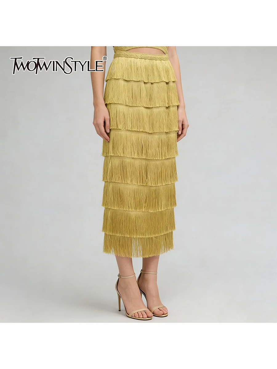 TWOTWINSTYLE Solid Loose Spliced Tassels Minimalist Skirts for Women High Waist Patchwork Ruffles Fashion Skirt Female Clothing