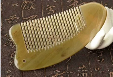 

Heart shaped ox horn comb natural pattern ox horn portable comb massage yak horn comb