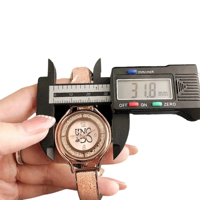 Orologio UNOde50 premium: accenti in argento e oro |   Eleganza scontata per fiducia Boost