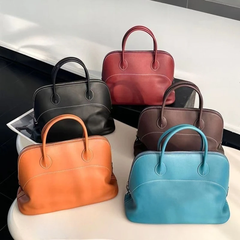 

First Layer Cowhide Bowling Ball Large Capacity Portable Fashion European and American Shell Bag Commuting Temperament Versatile