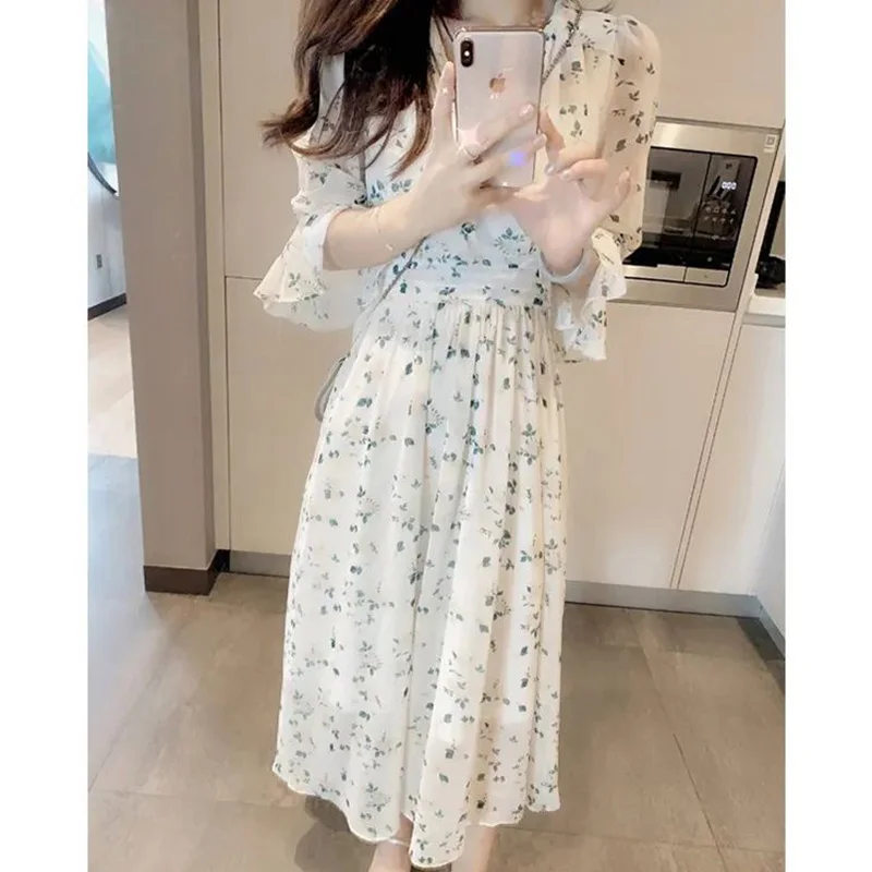 

Fashion V-Neck Printed Loose Folds Ruffles Long Dress Female Clothing 2023 Summer New Office Lady Flare Sleeve Floral Dress