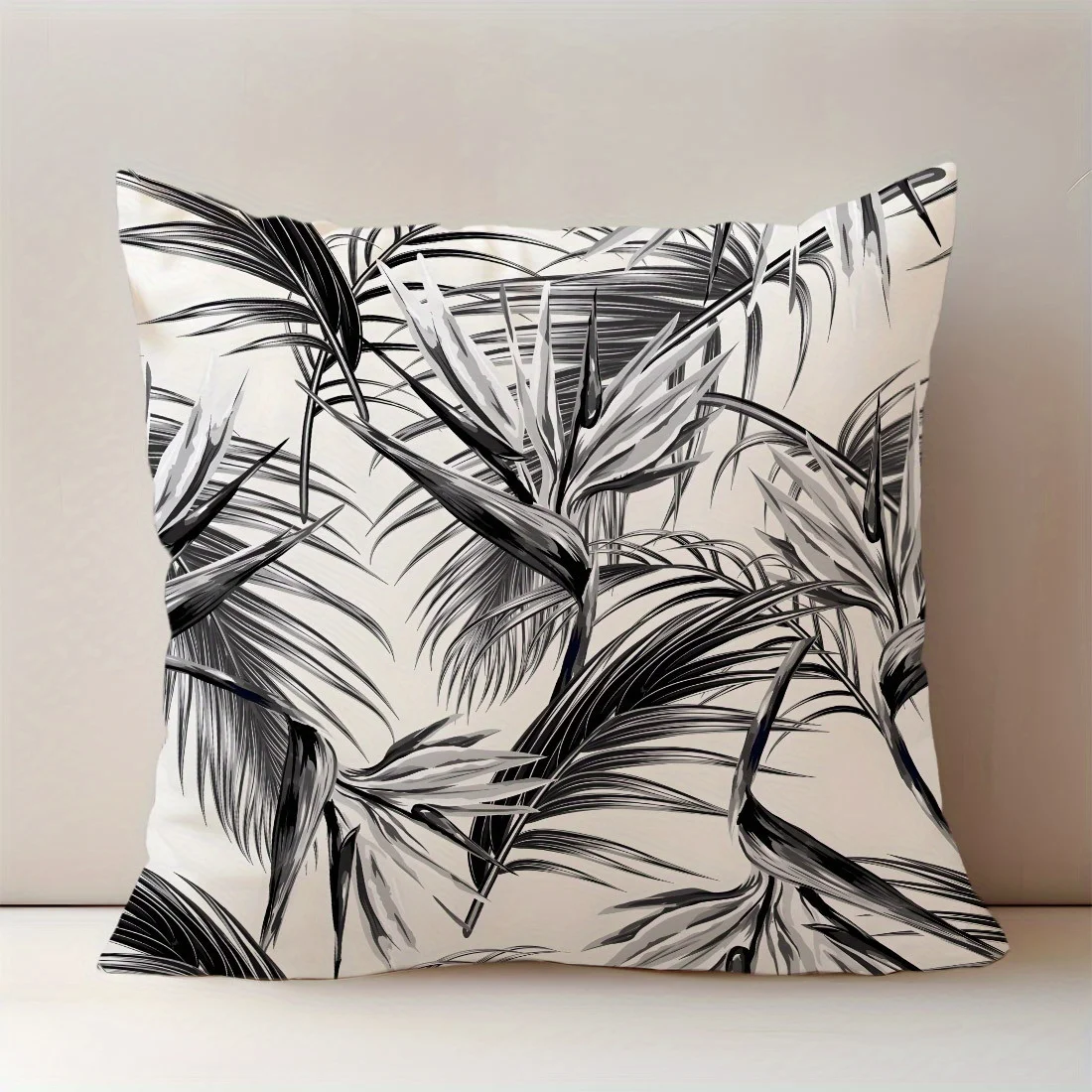Black and white leaf print throw pillowcase, machine washable polyester material, suitable for living room and bedroom decor.
