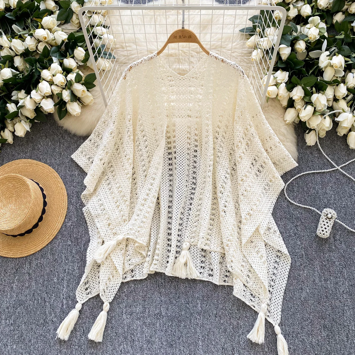 

2025 Spring And Autumn Vacation Style Beach Outerwear Knitted Shawl Women Bohemian Retro Loose Irregular Hollow Tassel Jacket
