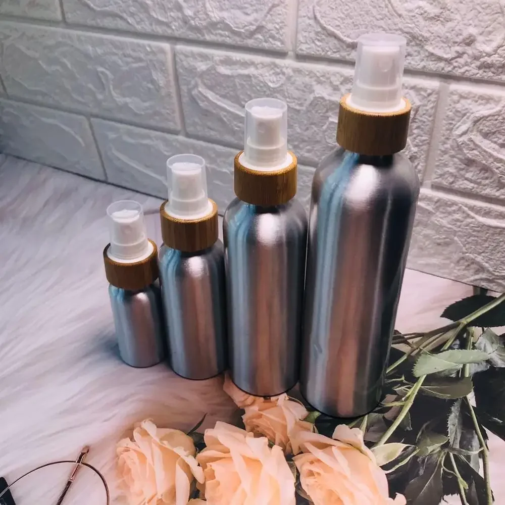 

refillableempty aluminum bottles with lid makeup container，bottles and cream jars bamboo cap spray lotion pump bottle with cap.