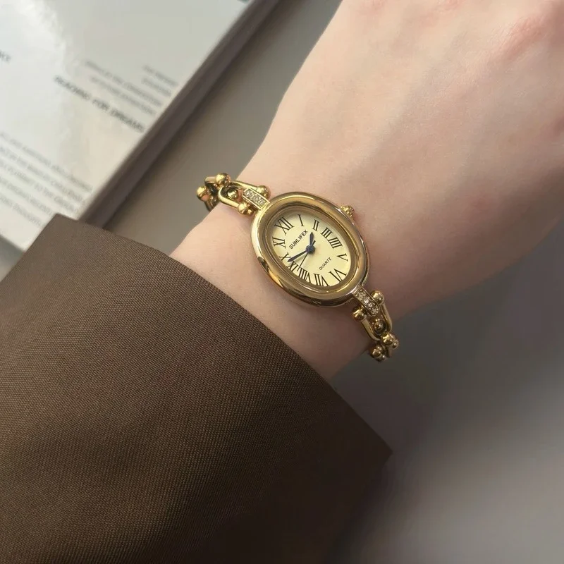 

Известные женские брендовые кварцевые часы с овальным циферблатом, винтажные часы с римским циферблатом, элегантные наручные часы-браслет, дропшиппинг, подарки Relógio