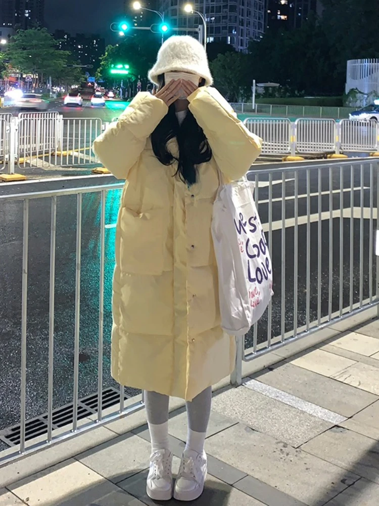 เสื้อโค้ทผู้หญิงสไตล์เกาหลี ผ้าฝ้าย แจ็คเก็ตฤดูหนาว ทรงยาว สไตล์ลำลอง ทรงขนมปัง เสื้อคลุมยาวคลุมเข่า ทรงหลวม สวมใส่สบาย