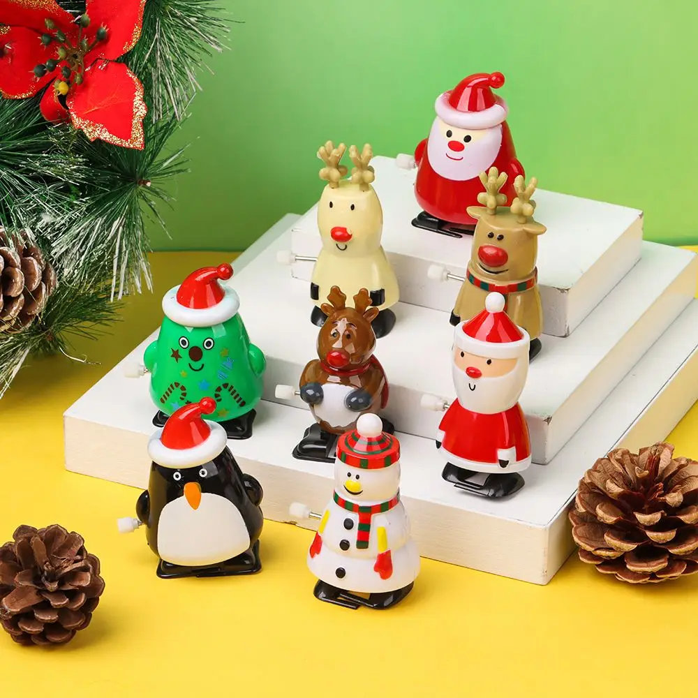 クリスマスのギフト詰め合わせ、パーティーの記念品、ゼンマイ仕掛けのおもちゃ、ジャンプと歩くおもちゃ、グッズバッグの詰め物、クリスマスの靴下の詰め物