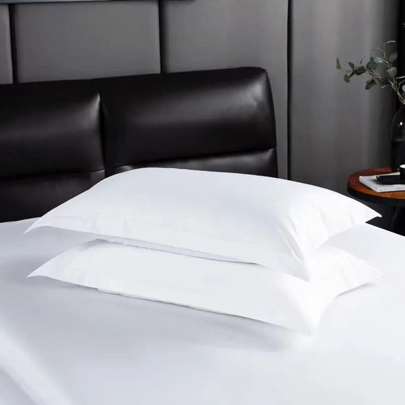 A pair of white pillowcases for hotels, inns, and guesthouses, single pure white pillowcases for single or double beds
