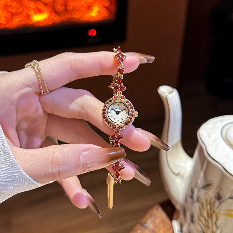 light luxury bracelet quartz women\'s watch red pomegranate mini small dial 2024 new tassel medieval watch women\'s small gold