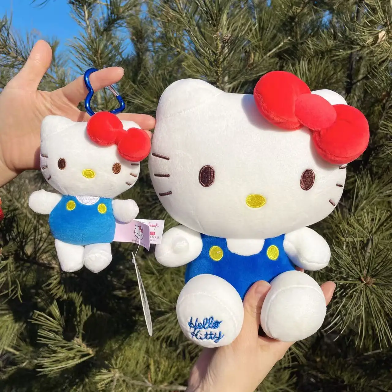 คลาสสิกสีฟ้าHello Kittyตุ๊กตาพวงกุญแจตุ๊กตาตุ๊กตาสัตว์ตุ๊กตาของเล่นเด็กกระเป๋าเป้สะพายหลังHangingsของขวัญวันเกิดคริสต์มาส