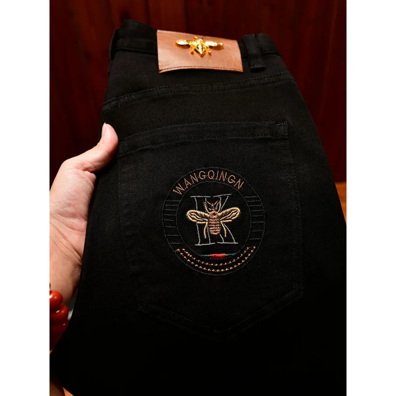 高級黒ジーンズ メンズ 秋 ライトラグジュアリー トレンド メンズ服 細身 刺繍プリント カジュアルパンツ