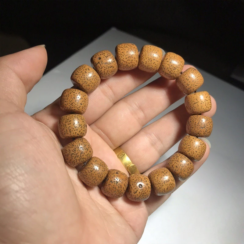 

Manizi Xingyue Bodhi Hainan Bodhi Natural Aged Seed Men's Bracelet Wenwan Buddha Bead 10 * 14 Xingyue