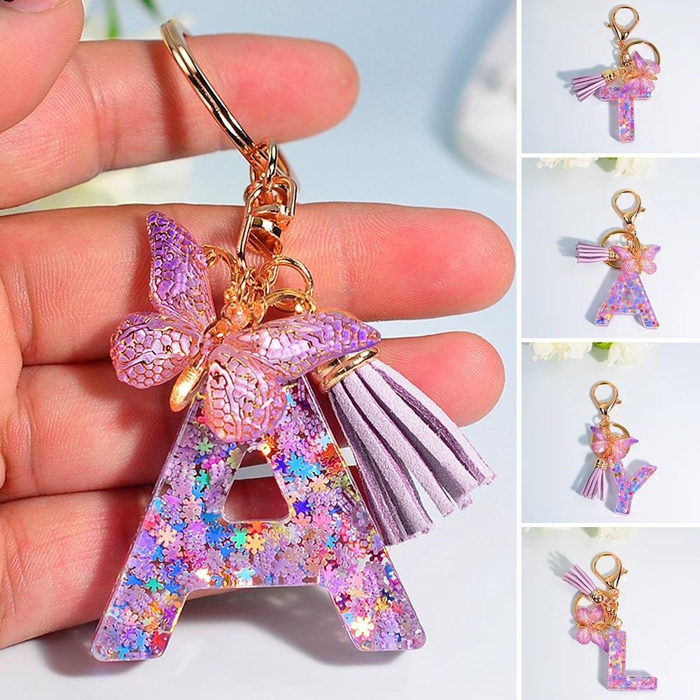 Porte-clés papillon flocon de neige violet pour femme, lettre A à Z, alphabet 26 initiales, pendentif pompon, clé, bijoux, cadeau