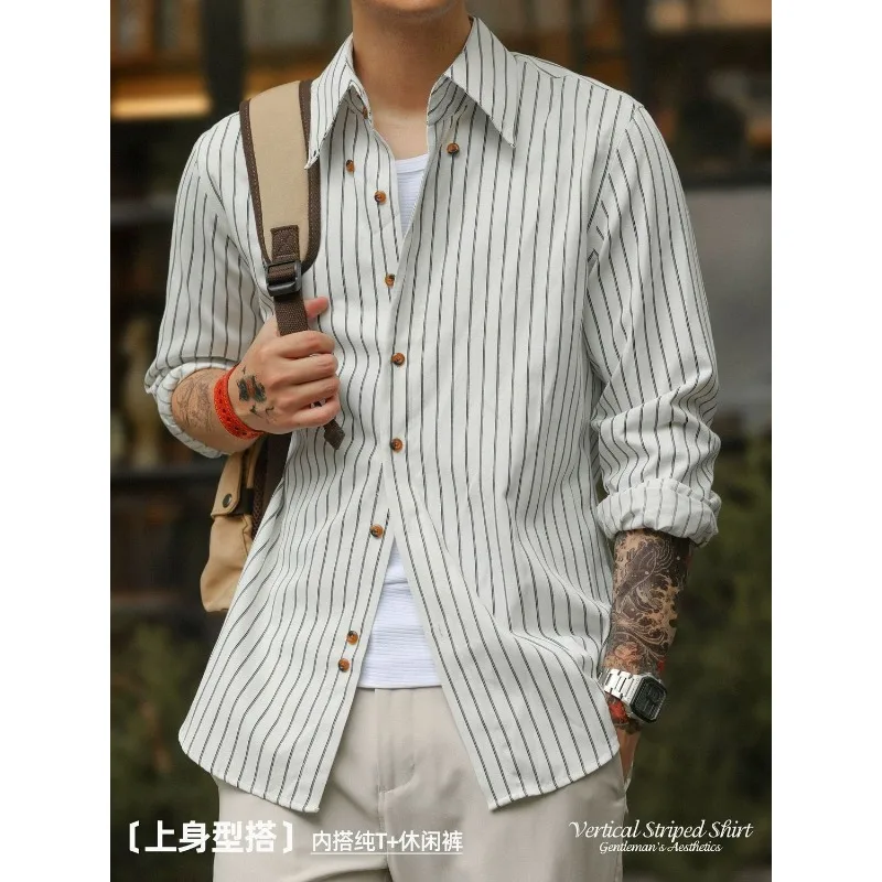 قميص فرنسي مخطط بأكمام طويلة مع ياقة مدببة للخريف قميص رجالي جديد عصري غير رسمي خالي من الحديد بقصة ضيقة ومتعدد الاستخدامات #1