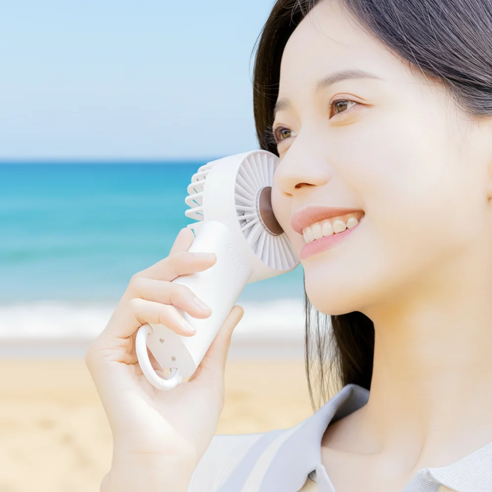 OEM Custom USB Handheld Fan Portable Mini Air Cooling Fan Rechargeable DC 5V 4000mah Plastic Outdoor Cold Compress Fan view 2