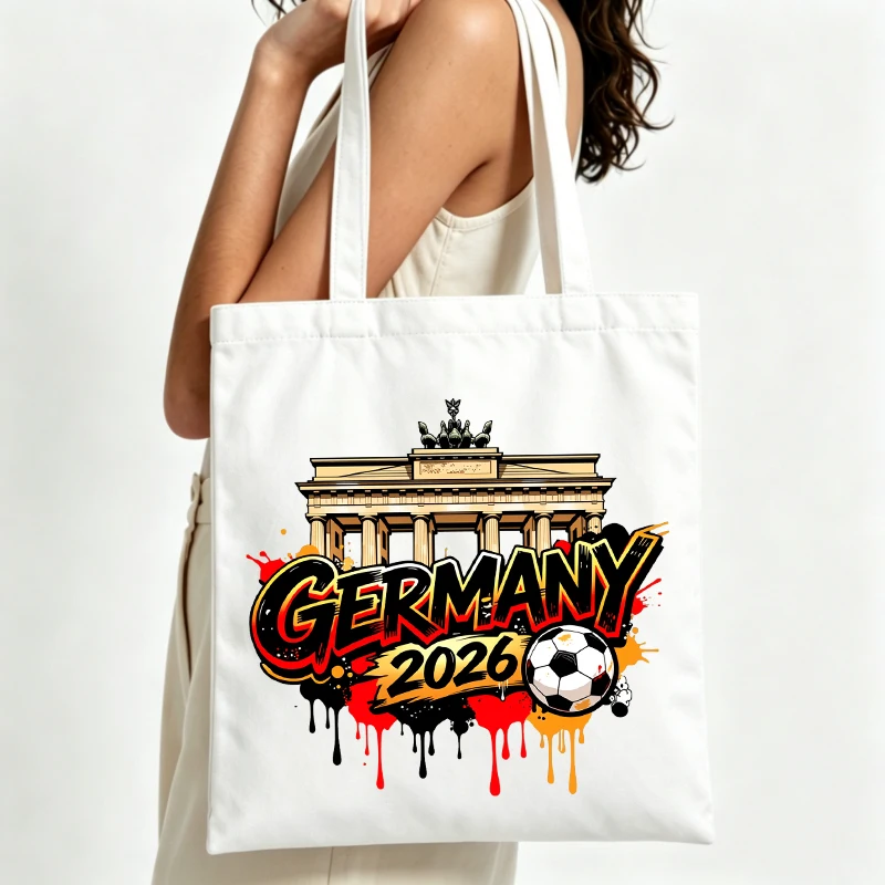 Women's Berlin landmark graphic canvas tote bag with soccer and typography print, ideal for casual daily use and travel