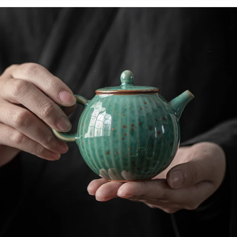 Jingdezhen Jun kiln ceramic tea kettle black Pu'er maker becomes kung fu set Xishi pot one-person household