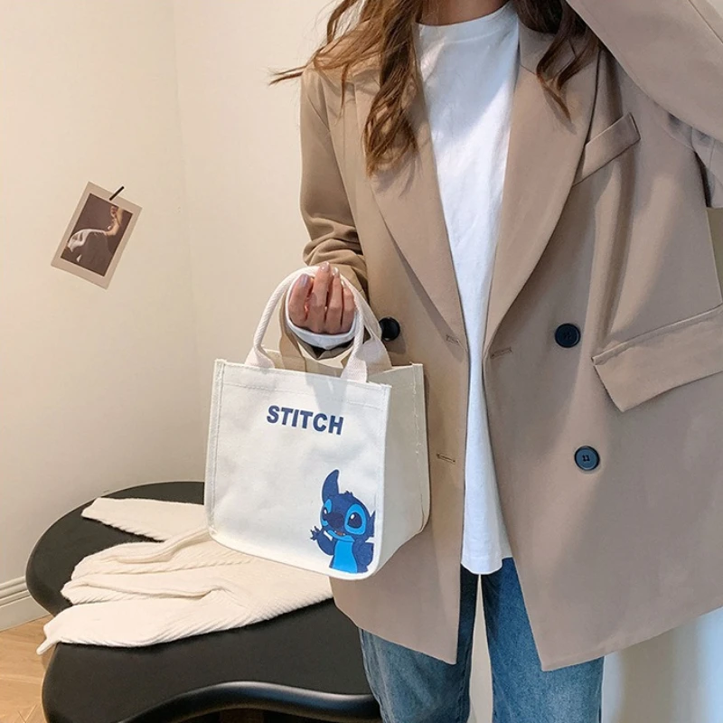 

Новинка 2026: Холщовая сумка-тоут с мультяшными персонажами Винни-Пух и Стич для женщин, маленькая милая повседневная сумка через плечо для шопинга