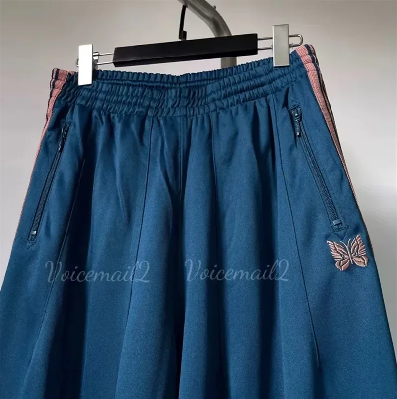 25ss เย็บปักถักร้อยผีเสื้อ Nee dles ขากว้างกางเกงลาย 1:1 Oversize Claret AWGE Casual กางเกงแท็ก