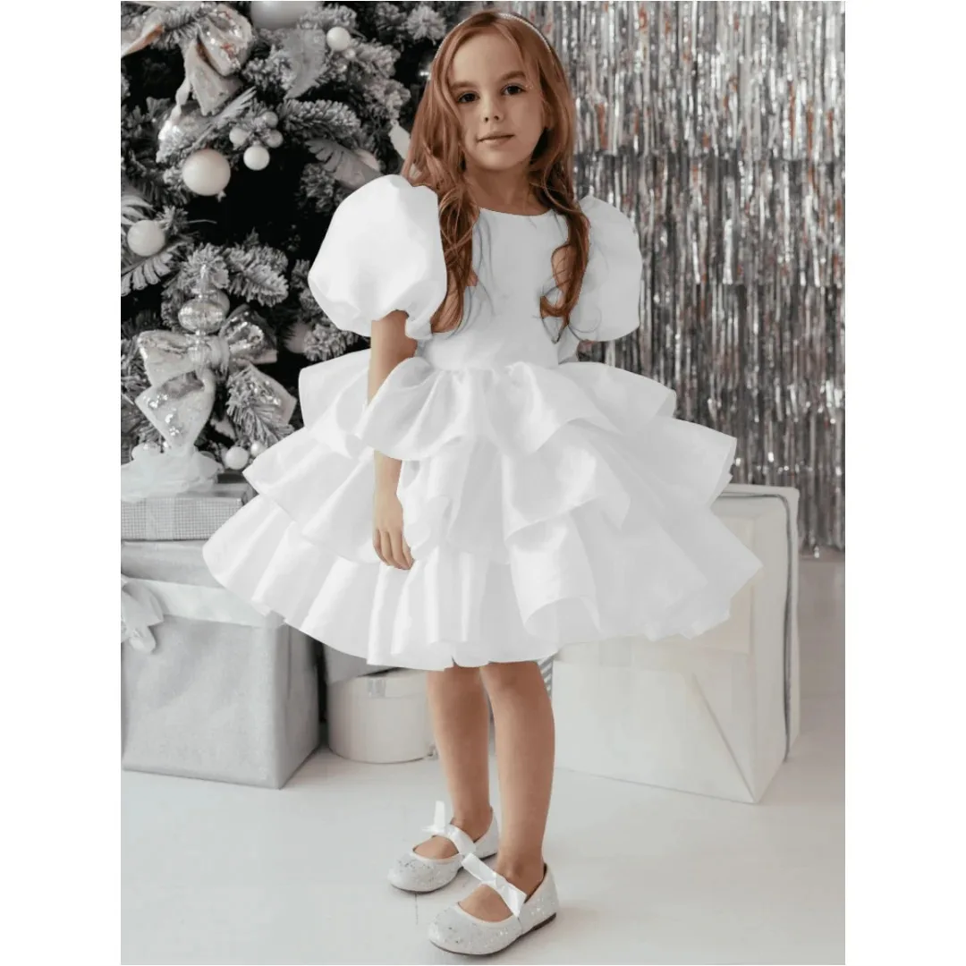 

Custom white layered flower girl dress with short sleeves and a bow, suitable for weddings, communion dresses, and birthday part