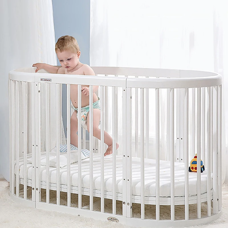 Oval Shaped Baby Crib Multifunctional Pine Children's Bed European White Newborn Baby Movable Splicing Large Bed image 6