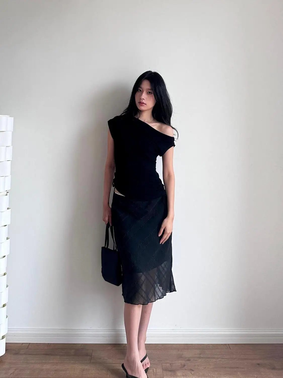 Design Sense Oblique Cut Plaid Skirt Women's Summer New French Niche Slim-fitting Versatile Medium and Long Skirt