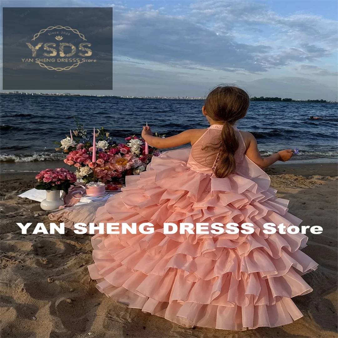 فستان زفاف مخصص بطبقات مكشكشة بدون أكمام وردي فاتح لفتاة الزهور للطفل فستان حفلة عيد ميلاد إفخارستيا الأولى