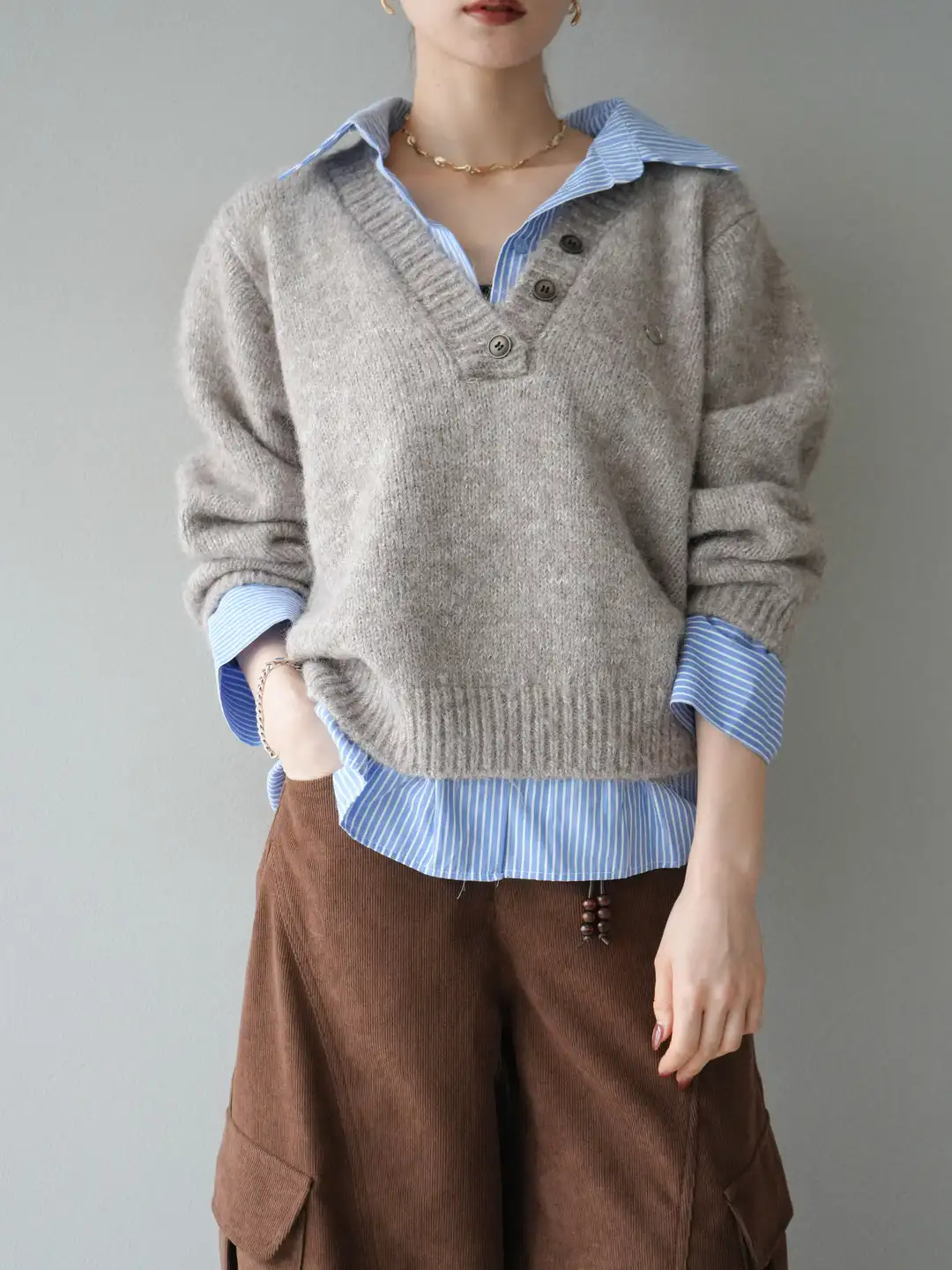 เสื้อถักสไตล์เกาหลีญี่ปุ่นลายทางต่อผ้าสำหรับผู้หญิง ทรงหลวม ใส่ได้ทั้งฤดูใบไม้ผลิและฤดูใบไม้ร่วง แขนยาว ระบายอากาศได้ดี