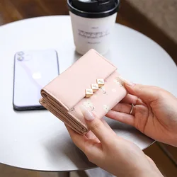 Autumn and winter new women's short wallet Korean PU high texture iron frame printed small square bag simple and versatile stude
