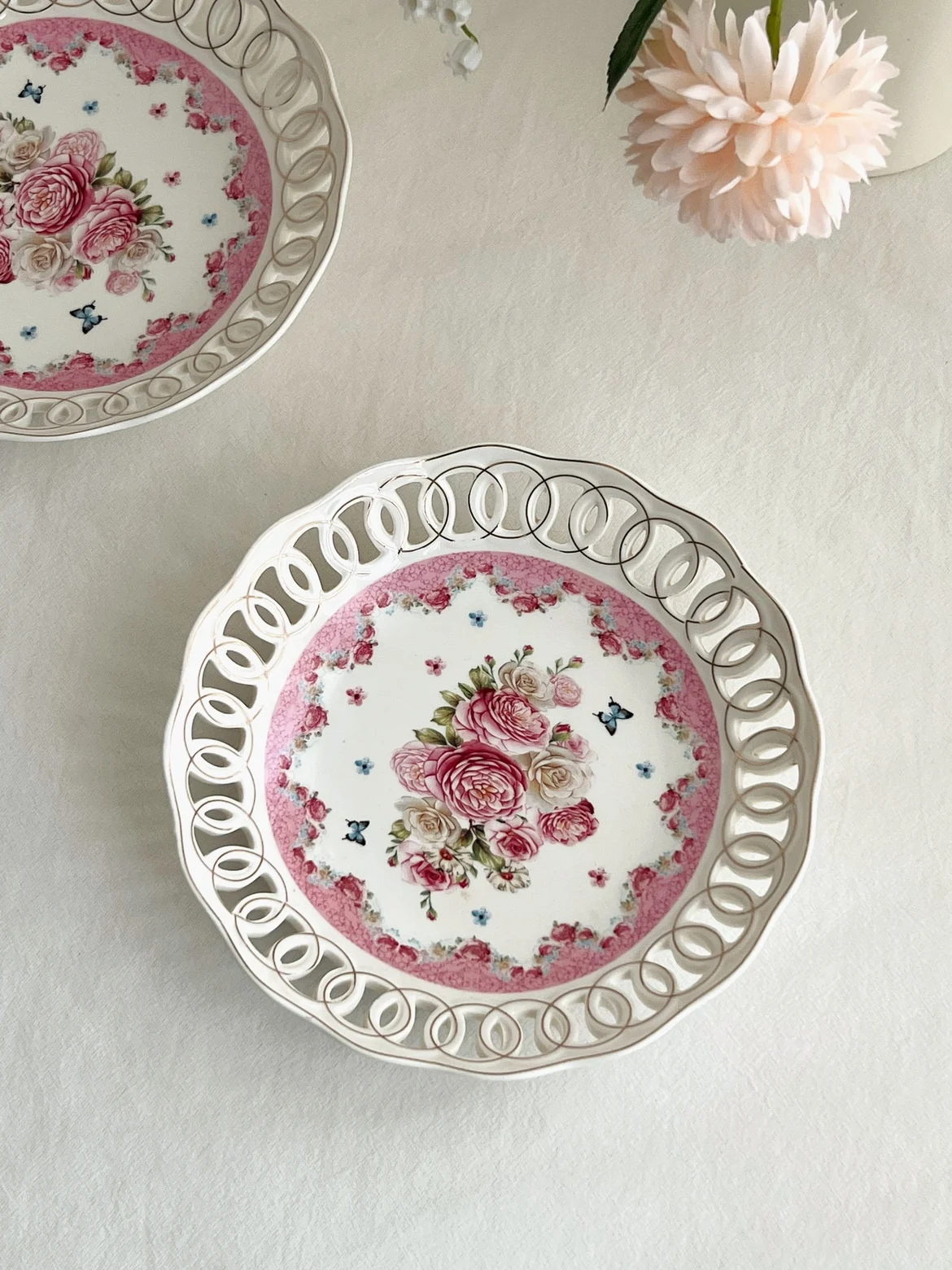 

Middle Eastern vintage handmade carving of hollow pink flower ceramic plates with swinging plates