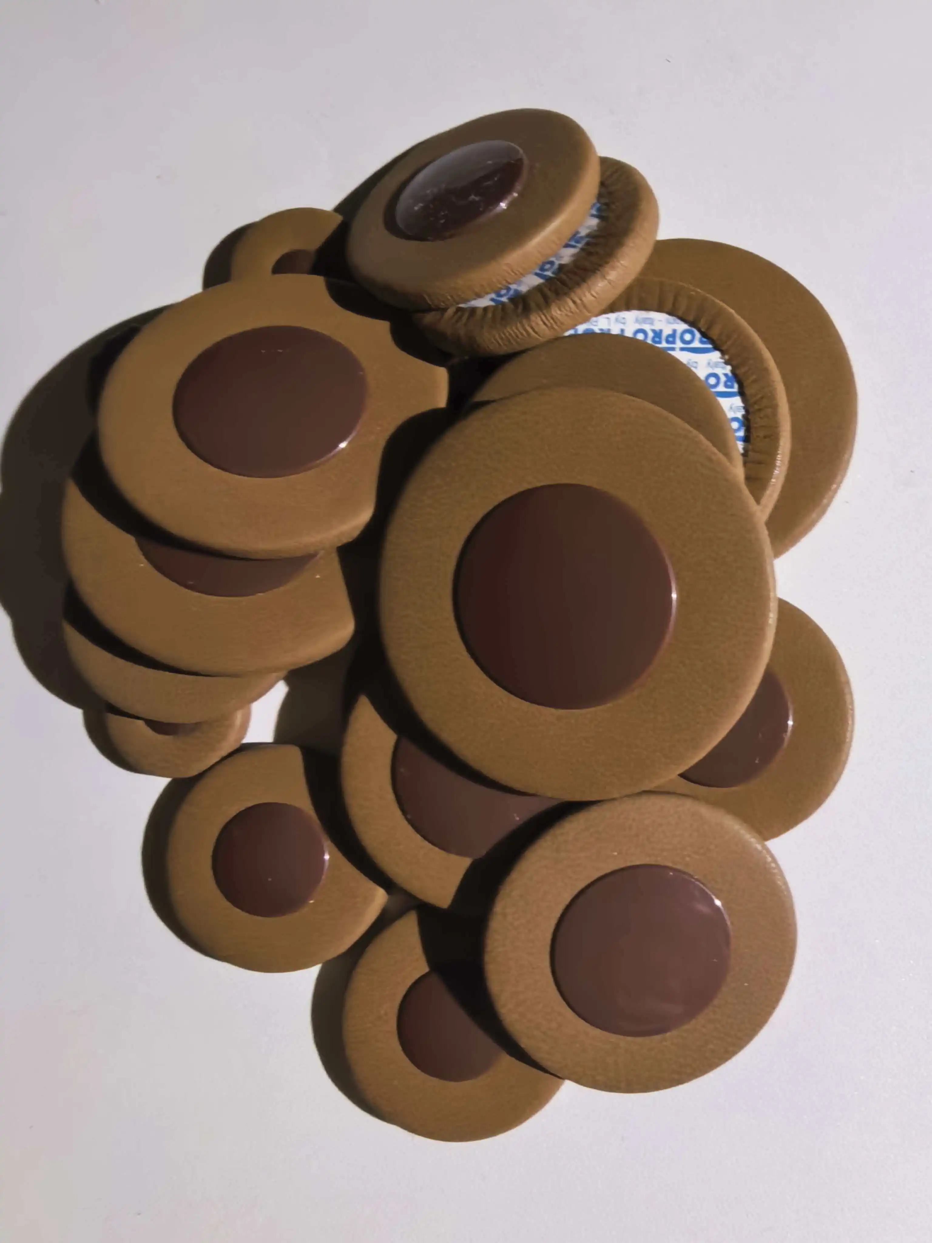 

Saxophone leather pads, tenor and alto genuine leather sealing sound hole pads, coffee-colored maintenance key sheepskin