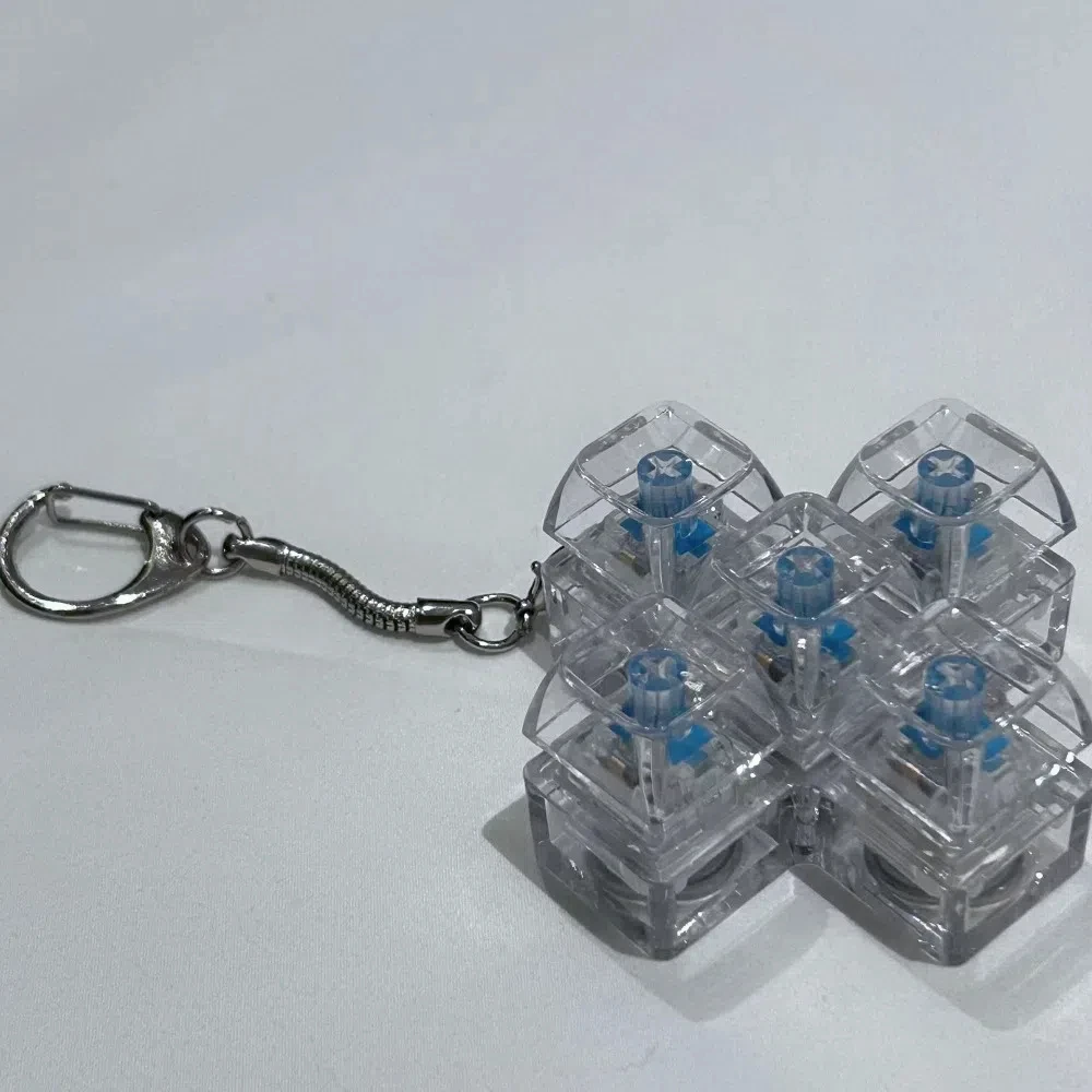 Entspannende 4/5 Tasten Finger Tastatur Stressabbau Taste Tastenkappe Dekompression Schlüsselbund Bestehen Sie die Zeit Gadget Clicker Spielzeug Erwachsene