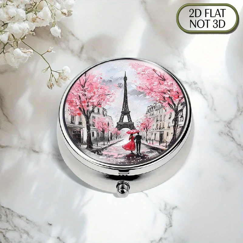 A flat, portable, round metal pill box, decorated with the Eiffel Tower and cherry blossom patterns, is a perfect and stylish choice for storing medication, vitamins, and daily essentials. This multifunctional storage box is also a thoughtful gift for friends and relatives, flat design