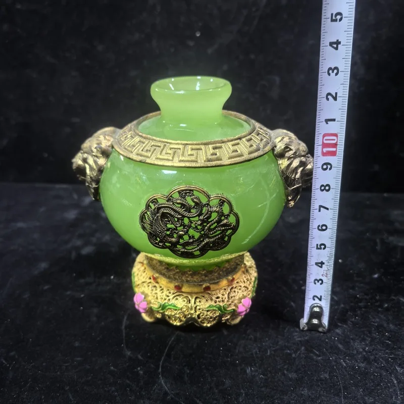 Gilded double-eared porcelain vase with two dragons, a decorative piece featuring gold inlay and luminous flowers