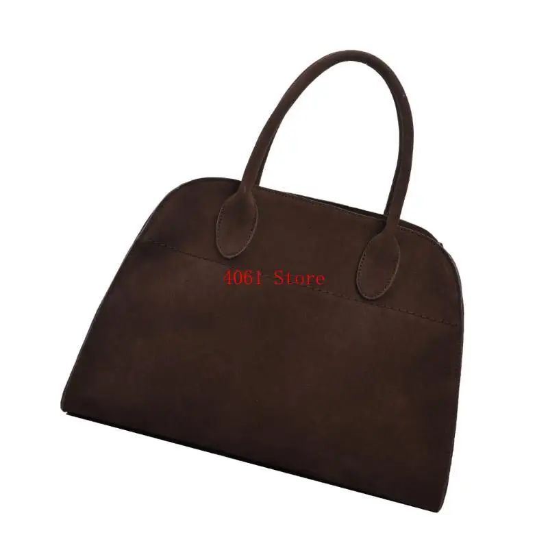 

Женщины переворачивают сумку стильную сумку с перекрестной ручкой с большой емкостью.