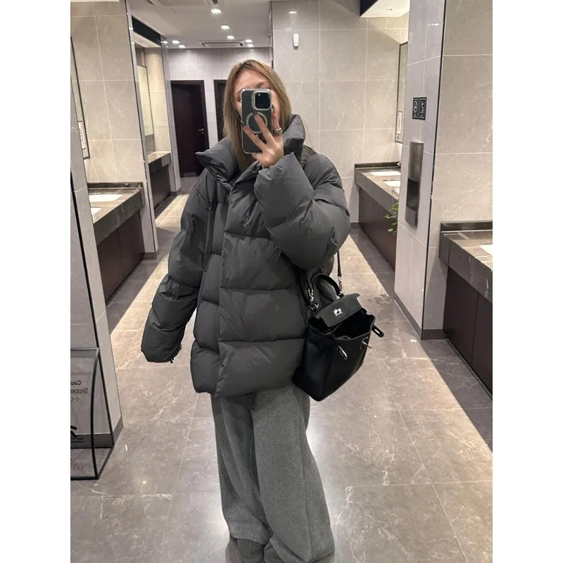 Black Medium To Long Cotton Jacket for Women in Winter 2025 Fashionable New Style Loose and Thick Stand Up Collar Parkas