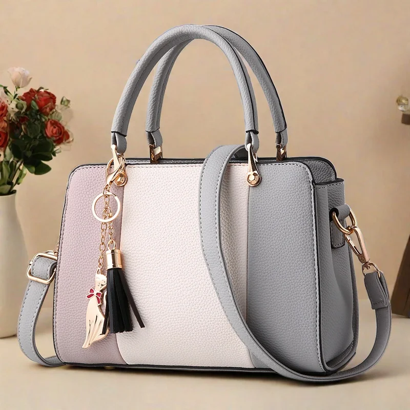 Nova bolsa de ombro feminina para 2025 designer de luxo bolsa feminina bolsas de couro impresso monograma ombro único straddle saco