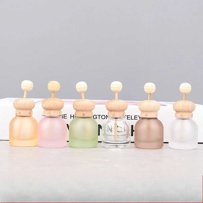 Bottiglia di profumo da 10 ml in vetro con coperchio in legno Deodorante per auto Ornamento Bottiglia vuota per styling auto per diffusore di oli essenziali