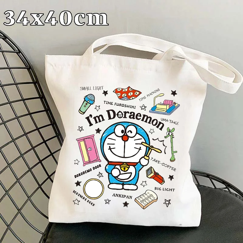 

Сумка-шоппер из ткани с изображением японского аниме Дораэмон, модная вместительная сумка через плечо, портативная сумка с мультяшным принтом, милая сумка-кроссбоди.